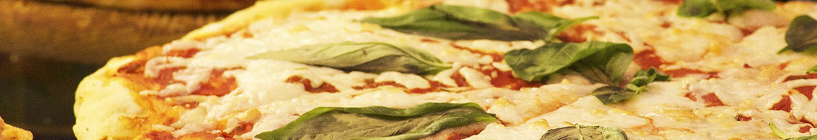 Eating Italian Pizza at Giovanni's Pizzeria restaurant in Mammoth Lakes, CA.